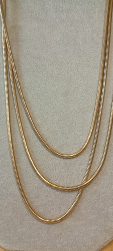 Triple row golden slinky - row,